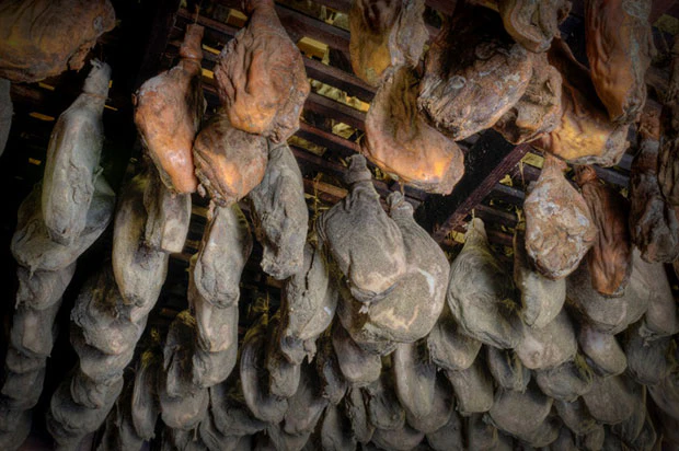 Hams hanging in the Smokehouse at Dardens